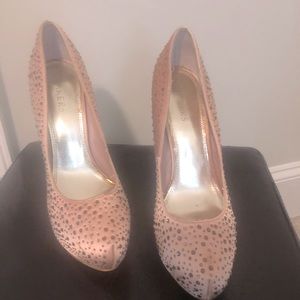 Studded pink stiletto.